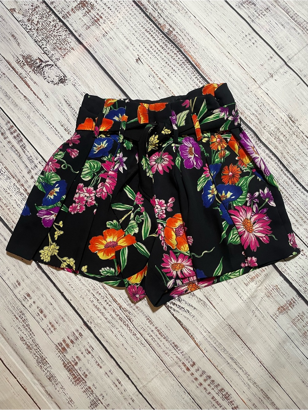 Express Shortie black floral high-waisted shorts. Size 2.